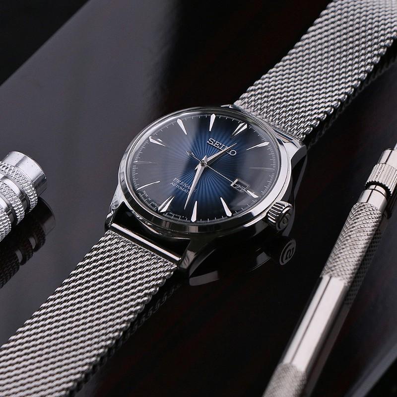 A Seiko watch with Milanese bracelet