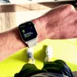 Close-up of a wrist adorned with a sports watch, highlighting the advanced features of an Apple Watch.