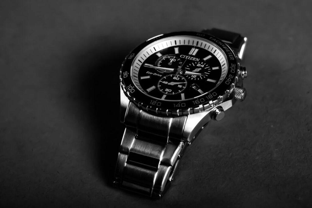 A Citizen Eco-Drive Chronograph Watch laying on smoth surface