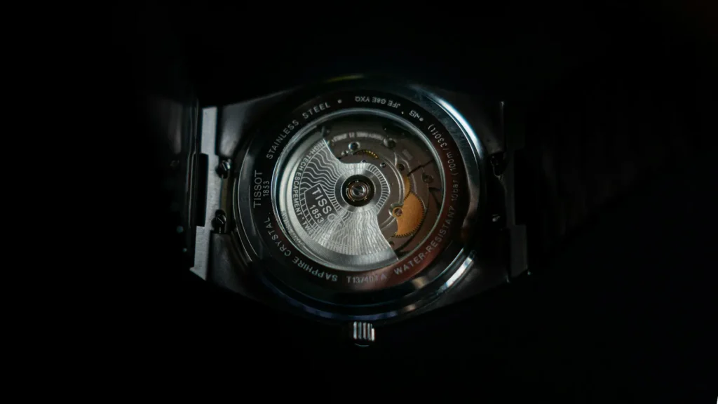 Close-up of the back side of the Tissot watch showing the Powermatic 80 movement