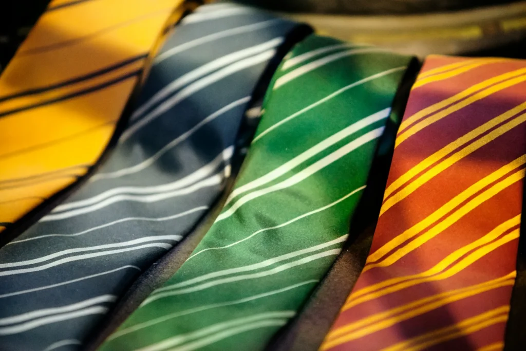 A stylish display of Harry Potter ties in different house colors.