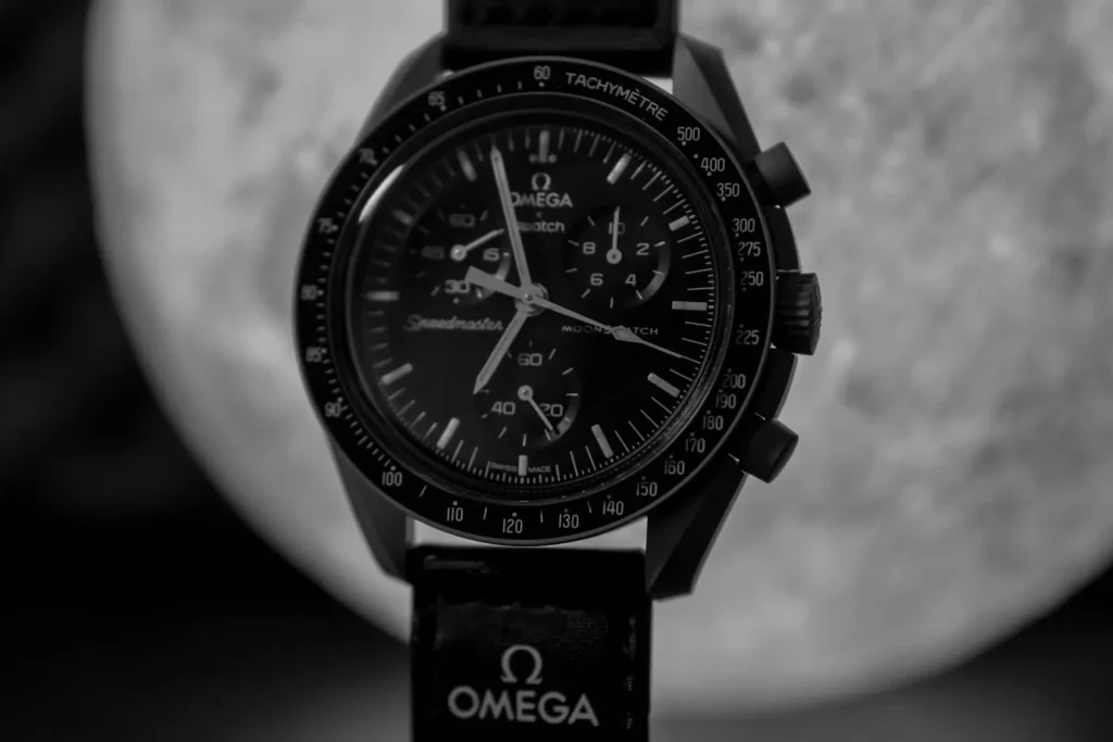 A chronograph Omega watch with tachymeter bezel