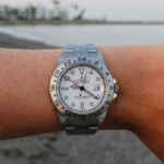 Close-up of a man's wrist wearing a Rolex GMT watch