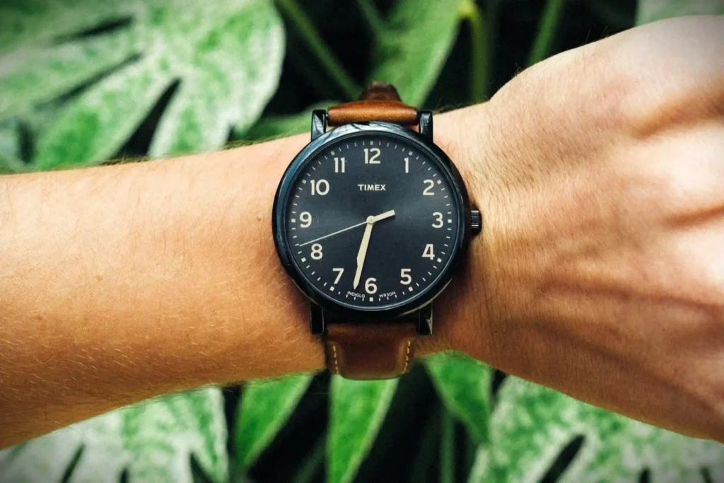 Close-up of a Timex watch on a person's wrist