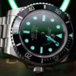 Close-up of a Rolex Submariner dive watch, highlighting its luminous hands and markers, along with the uni-directional bezel.