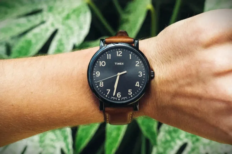 Close-up of a Timex watch on a person's wrist.