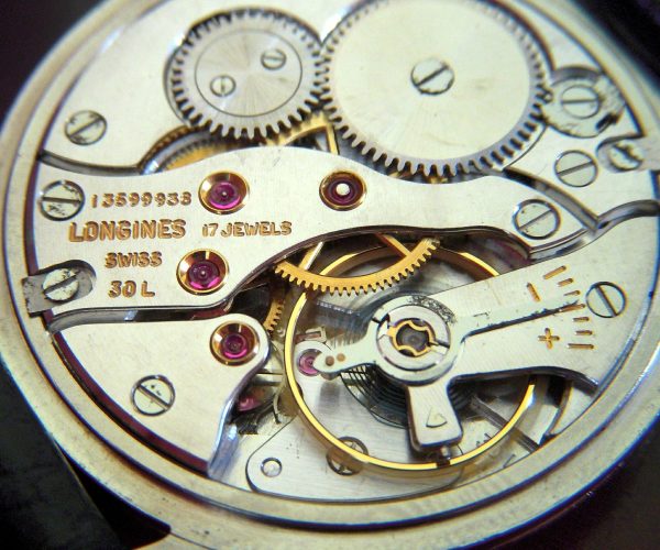 A Back Side of Watch Showing the Movement.