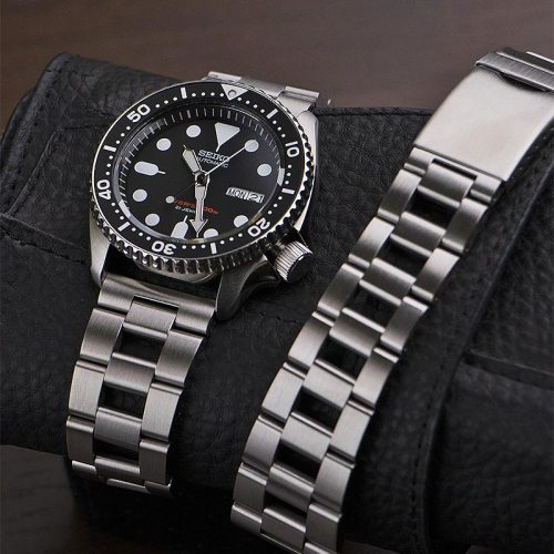 A Seiko watch with a Ladder Bracelet attached