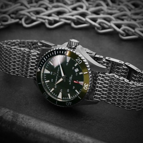 A Black dial Hamilton watch with shark mesh bracelet